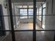 Enclosed porch with views for a relaxing sun room or versatile space at 337 Rex Pl # B, Madeira Beach, FL 33708