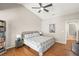 Cozy bedroom with bedside tables, lamps, hardwood floors and ample light at 5141 Sunnydale W Cir, Sarasota, FL 34233