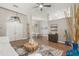 Expansive living room showcasing high ceilings, hardwood floors, and a seamless transition to dining area at 5141 Sunnydale Cir, Sarasota, FL 34233