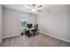 Bedroom featuring neutral walls, ceiling fan, carpet and window at 6241 Spider Lily Way, New Port Richey, FL 34653