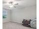 Bonus room with a ceiling fan and neutral carpet at 6241 Spider Lily Way, New Port Richey, FL 34653