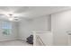 Bright bonus room with a ceiling fan and neutral carpet at 6241 Spider Lily Way, New Port Richey, FL 34653