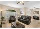 An open-concept living room provides lots of seating, with a view of the office and kitchen at 6345 Vista Verde E Dr, Gulfport, FL 33707