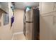 Laundry room with stacked washer and dryer at 7069 Key Haven Rd # 205, Seminole, FL 33777