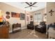 Comfortable living room with two recliners and hardwood floors at 7069 Key Haven Rd # 205, Seminole, FL 33777