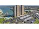 Expansive aerial view of the condo building showing its proximity to the marina, pool, covered parking and beautiful waterfront location at 7300 Sun Island S Dr # 802, South Pasadena, FL 33707