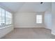 Bedroom with carpet, dual windows for natural light, and a closet at 8907 Ashford Gables, Tampa, FL 33626