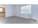 Bedroom with carpet, a window seat, and an ensuite bathroom at 8907 Ashford Gables, Tampa, FL 33626