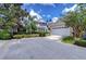Beautiful two-story home featuring a well-manicured lawn and a spacious two-car garage, creating an inviting entrance at 8907 Ashford Gables, Tampa, FL 33626