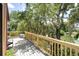Back porch overlooking water with mature trees at 9501 Alice Ln, Riverview, FL 33578