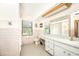 A bathroom featuring a long vanity and vintage tile at 9501 Alice Ln, Riverview, FL 33578