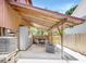 Cozy outdoor space, perfect for dining and relaxation, featuring a covered patio and ample seating at 9501 Alice Ln, Riverview, FL 33578