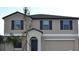 Charming two-story home featuring a two car garage and neutral paint scheme at 10111 Rosemary Leaf Ln, Riverview, FL 33578