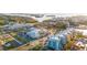 Aerial view of condos near the beach, featuring ample parking and easy access to the waterfront at 1100 Pinellas Bayway S # H2, Tierra Verde, FL 33715