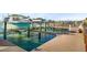 Boat on lift at dock and clear waterfront views at 1100 Pinellas Bayway S # H2, Tierra Verde, FL 33715
