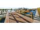 Wooden walkway along a boat dock at 1100 Pinellas Bayway S # H2, Tierra Verde, FL 33715