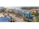 Exterior view of a multi-unit building near the beach with a view of the water at 1100 Pinellas Bayway S # H2, Tierra Verde, FL 33715