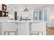 Bright kitchen featuring a center island with counter seating at 1100 Pinellas Bayway S # H2, Tierra Verde, FL 33715