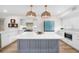 Bright kitchen with a center island and stainless steel appliances at 1100 Pinellas Bayway S # H2, Tierra Verde, FL 33715