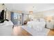 Bright bedroom with sliding glass doors to a balcony, offering natural light at 1100 Pinellas Bayway S # H2, Tierra Verde, FL 33715