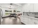 Open concept living space with updated kitchen and living area providing plenty of space at 1103 E Louisiana Ave, Tampa, FL 33603
