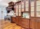 Beautiful kitchen with custom cabinetry, stainless steel range, and designer backsplash at 12010 Hardaman Pl, Tampa, FL 33618
