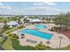 Expansive aerial view of community pools and recreation area with ample seating and lush surroundings at 13176 Twin Bridges Dr, Riverview, FL 33579