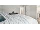 Cozy bedroom featuring light-colored walls, and access to the bathroom and a closet at 13176 Twin Bridges Dr, Riverview, FL 33579