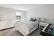 Bright bedroom featuring white walls, plush carpet, and a comfortable bed, creating a serene retreat at 13176 Twin Bridges Dr, Riverview, FL 33579