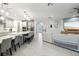Bright, open-concept kitchen and living area is perfect for entertaining and modern living with stylish accents at 13176 Twin Bridges Dr, Riverview, FL 33579