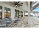 Covered lanai featuring ceiling fans and beautiful pavers at 13176 Twin Bridges Dr, Riverview, FL 33579