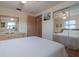 Bright bedroom featuring ample natural light from a large window at 1623 Dartmouth Dr, Holiday, FL 34691