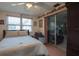 Cozy bedroom featuring ample natural light and closet space at 1623 Dartmouth Dr, Holiday, FL 34691