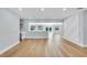 Bright dining area featuring sleek hardwood floors and an open layout for easy access to other areas at 1842 Oklahoma Ne Ave, St Petersburg, FL 33703