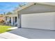 Close up of the exterior, focusing on the two-car garage and updated facade at 1842 Oklahoma Ne Ave, St Petersburg, FL 33703