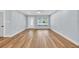 Spacious living room features a large window and a door leading outside at 1842 Oklahoma Ne Ave, St Petersburg, FL 33703