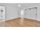 Bright, empty main bedroom featuring a walk-in closet and ensuite bathroom at 1842 Oklahoma Ne Ave, St Petersburg, FL 33703