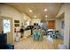 Open kitchen featuring stainless steel appliances, island with seating, and abundant natural light at 2504 Avenue B # A, Bradenton Beach, FL 34217