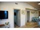Open concept living space with views of the dining area and access to bedrooms at 2504 Avenue B # A, Bradenton Beach, FL 34217