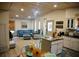 Bright living room with a stylish blend of kitchen decor, furnishings, and abundant natural light at 2504 Avenue B # A, Bradenton Beach, FL 34217