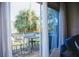 Enjoy outdoor dining on the cozy patio with comfortable seating and views of lush greenery at 2504 Avenue B # A, Bradenton Beach, FL 34217