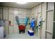 Bright storage room with white walls, offering ample space for storing beach equipment at 2504 Avenue B # A, Bradenton Beach, FL 34217