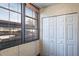 Enclosed porch with large windows, closet, and view of the community at 2587 Countryside Blvd # 6103, Clearwater, FL 33761