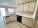 Spacious kitchen with stainless steel sink and ample counter space for meal preparation and cleanup at 28537 Fairweather Dr, Wesley Chapel, FL 33543