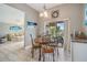 Cozy dining area with backyard views and adjacent access to the living room at 29312 Marker Loop, San Antonio, FL 33576