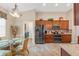 Kitchen with stainless steel appliances, custom cabinets, and granite countertops at 313 Old Windsor Way, Spring Hill, FL 34609