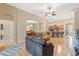 Open-concept living room that flows into the kitchen at 313 Old Windsor Way, Spring Hill, FL 34609