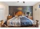 Luxurious main bedroom with a statement headboard at 313 Old Windsor Way, Spring Hill, FL 34609