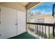 A balcony overlooking green spaces and blue skies with ample sunshine at 3350 Mermoor Dr # 1201, Palm Harbor, FL 34685