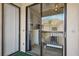 Private balcony overlooking neighboring landscaping and palm trees at 3350 Mermoor Dr # 1201, Palm Harbor, FL 34685